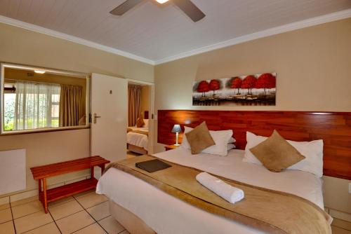 Voodi või voodid majutusasutuse Sunrock Guesthouse toas