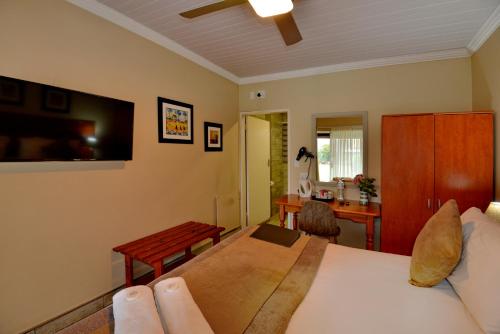 Voodi või voodid majutusasutuse Sunrock Guesthouse toas