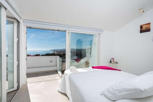 Postel nebo postele na pokoji v ubytování Casa Orquídea