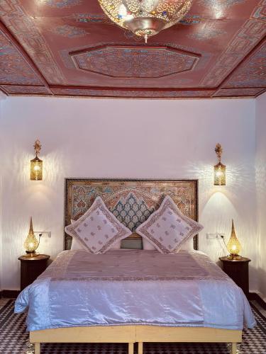 Riad Damia Suite & Spaにあるベッド