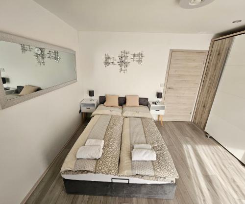 a bedroom with a large bed in a room at Sunny room 1 in Dinkelsbühl