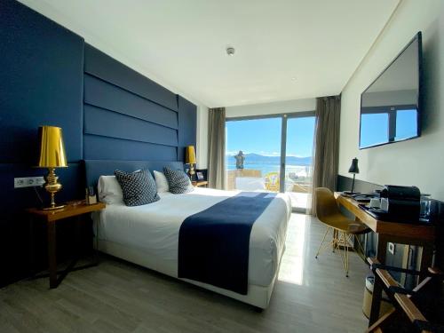 Cama ou camas em um quarto em Hotel Art Santander