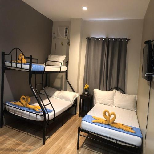 Postel nebo postele na pokoji v ubytování 2020 Travelers Inn