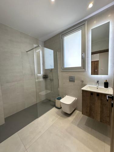 Ένα μπάνιο στο Joanna & Arya Central Engomi Apts