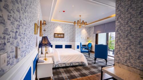 Postel nebo postele na pokoji v ubytování The Manor Luxury Apartments, Shimla