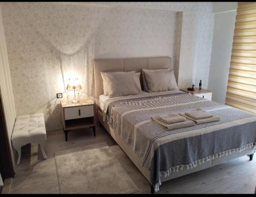 Postel nebo postele na pokoji v ubytování Eryaman, Wide Luxury Rezidance