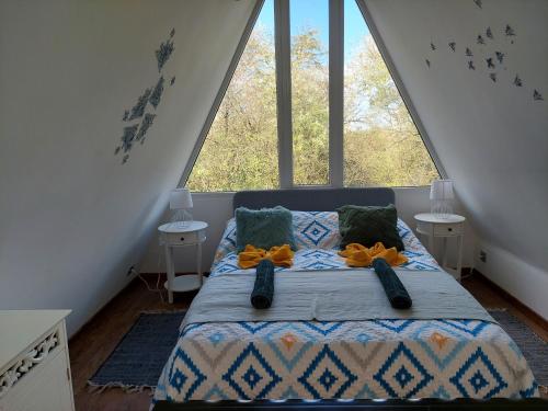 Postel nebo postele na pokoji v ubytování Farm Ház