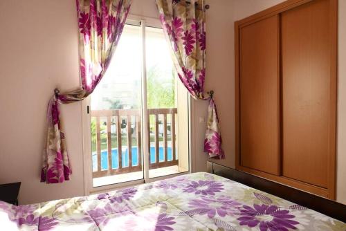 Ένα ή περισσότερα κρεβάτια σε δωμάτιο στο Appartement Haut Standing - Bouznika plage