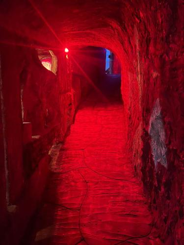a red tunnel with a red light on it at Hotel Golden Hills Manizales in Manizales