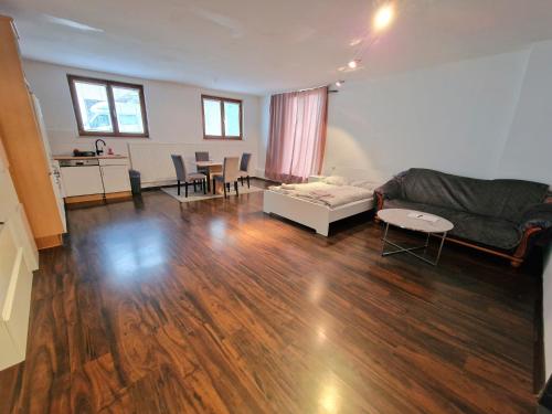 a living room with a couch and a table at Gudzevic - FU A 2 in Gloggnitz
