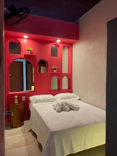 Postel nebo postele na pokoji v ubytování Hostal Poquito a Poquito