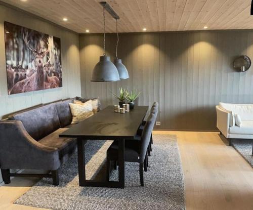 Zona de estar de Hovden Alpin Lodge! Ski in out