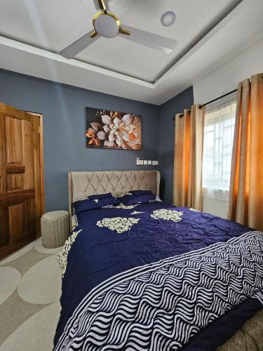 Llit o llits en una habitació de Tuki Quarter