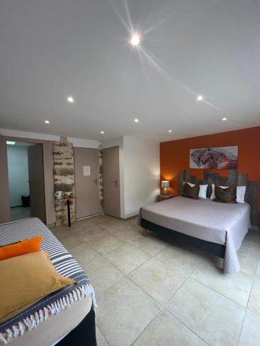 Cama o camas de una habitación en Au Petit Bignon