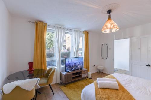 Ένα ή περισσότερα κρεβάτια σε δωμάτιο στο Opulent Heights