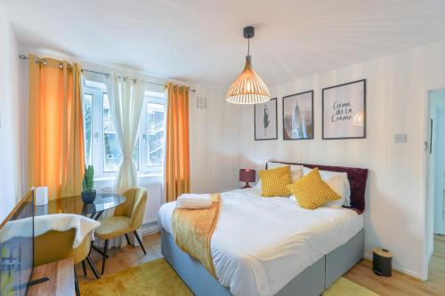 Ένα ή περισσότερα κρεβάτια σε δωμάτιο στο Opulent Heights