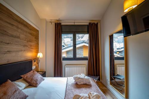 Postel nebo postele na pokoji v ubytování Apartaments Superior