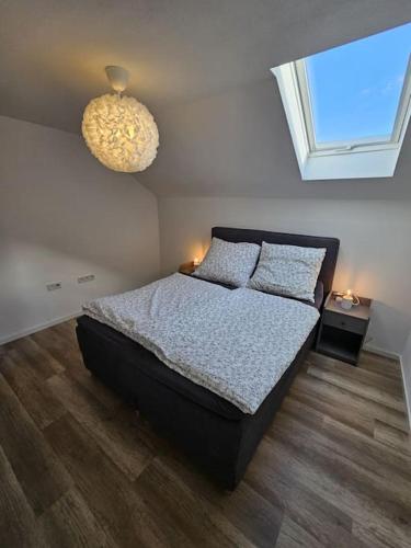 Postel nebo postele na pokoji v ubytování Moderne Ferienwohnung Attendorn