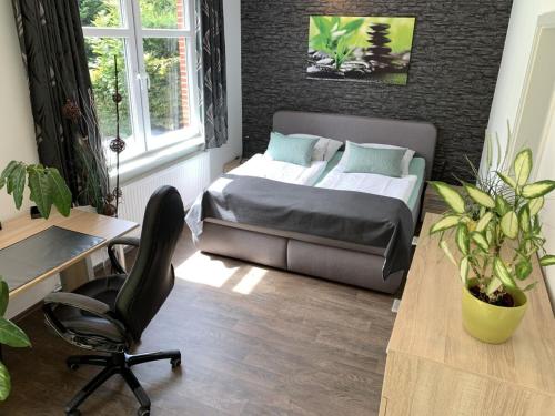 Posezení v ubytování Ferienwohnung LOFT- direkt am Falderndelft - nähe Innenstadt