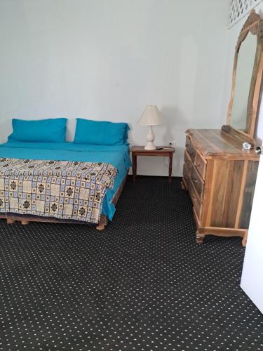 Cama ou camas em um quarto em 102 relax