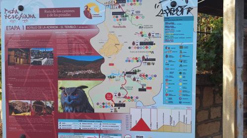 a poster of a map of thekkady with a picture of a cat at El Zaguan in Sotillo de la Adrada