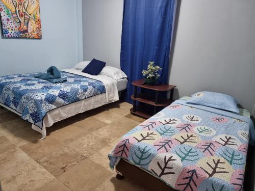 Ένα ή περισσότερα κρεβάτια σε δωμάτιο στο Dreamer's Hostel
