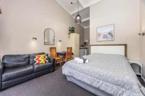 Postel nebo postele na pokoji v ubytování Sun Valley Motel