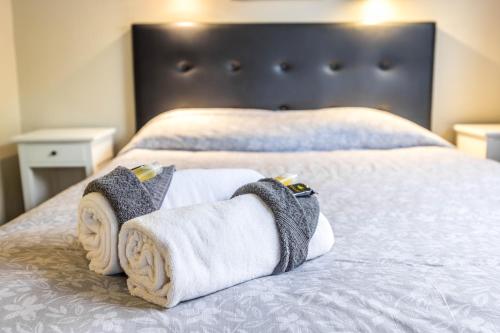 Postel nebo postele na pokoji v ubytování Sun Valley Motel