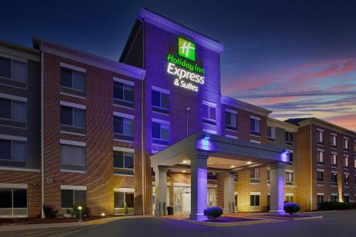 a hotel with a sign that reads healthcare express services at Holiday Inn Express & Suites Milwaukee NW - Park Place by IHG in Milwaukee