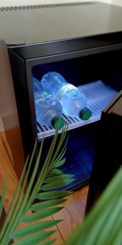 a close up of bottles of water in a microwave at Sweet Dreams in Civitavecchia