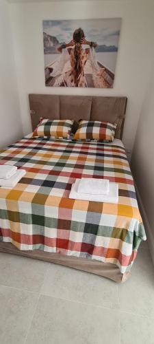 En eller flere senge i et værelse på Apartman Vesna