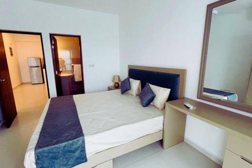 Ένα ή περισσότερα κρεβάτια σε δωμάτιο στο Beach Front studio luxury apartment