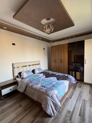 Postel nebo postele na pokoji v ubytování Apartment in jannet zayed 2