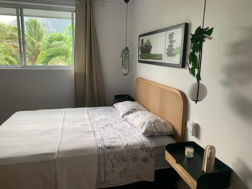 Postel nebo postele na pokoji v ubytování Tiki Ora lodge - Moana