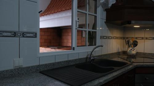 Kuchyň nebo kuchyňský kout v ubytování Quinta do Carmo house with View