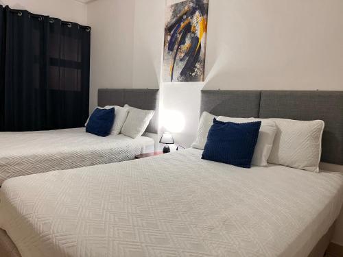Postel nebo postele na pokoji v ubytování Apartamentos Trebol