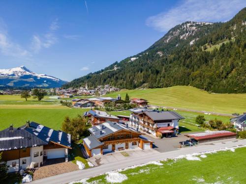 an aerial view of a village in the mountains at Maxima - Ski in - Ski Out in Flecken