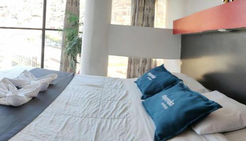 Postel nebo postele na pokoji v ubytování Hotel Platinum Palace