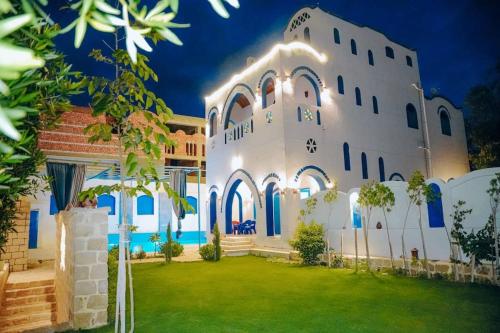 Zahrada ubytování Villa el Nassem