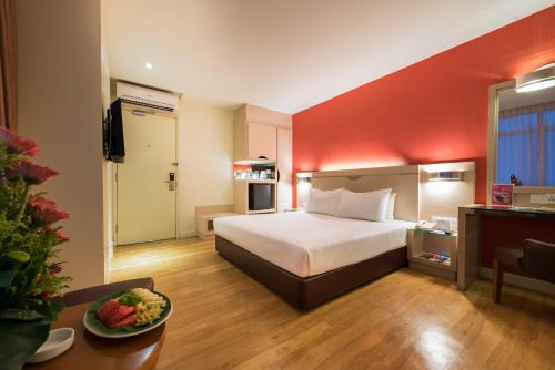 Postel nebo postele na pokoji v ubytování Hotel Sentral Georgetown @ City Centre