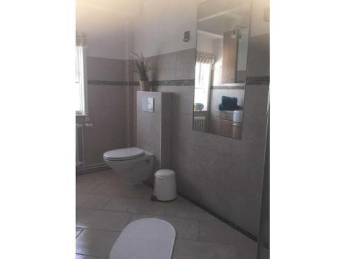 Ένα μπάνιο στο Poststuuv Comfortable holiday residence