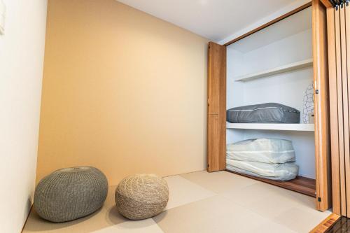 Postel nebo postele na pokoji v ubytování みらいステイ横手