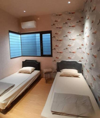 Ένα ή περισσότερα κρεβάτια σε δωμάτιο στο House of Merino at Ciumbuluit