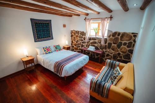 Voodi või voodid majutusasutuse Picaflor Tambo Guest House toas