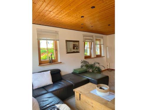 Ein Sitzbereich in der Unterkunft Grimm Comfortable Holiday Residence