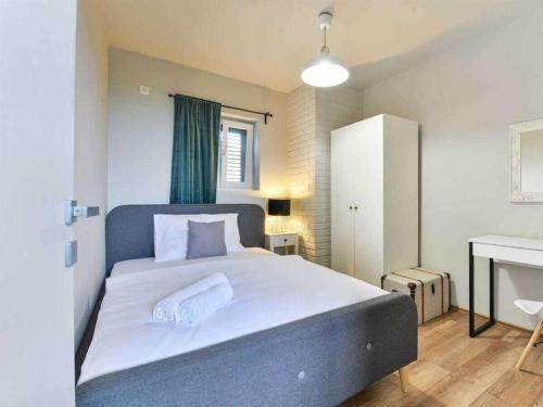 Postel nebo postele na pokoji v ubytování Villa Didovi Snovi Li ane