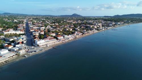 an aerial view of a city next to the water at PEDRO NAVARINO VII Laganas in Laganas