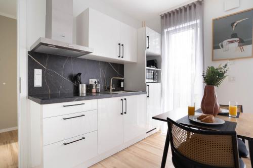 Η κουζίνα ή μικρή κουζίνα στο Schöne Apartments in der Innenstadt I home2share