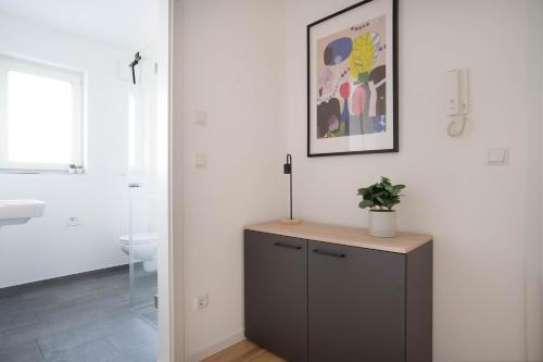 Ένα ή περισσότερα κρεβάτια σε δωμάτιο στο Schöne Apartments in der Innenstadt I home2share