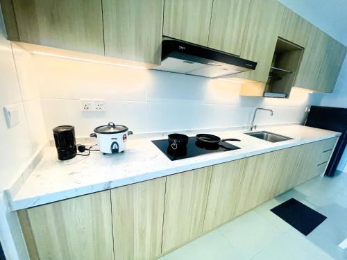 Reizz Residence Zen Denにあるキッチンまたは簡易キッチン